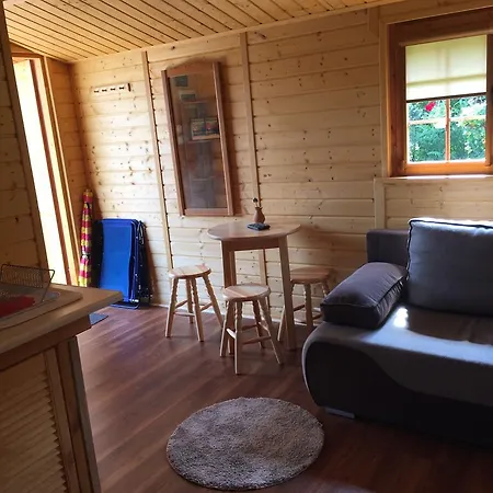 Деревянный коттедж Domek